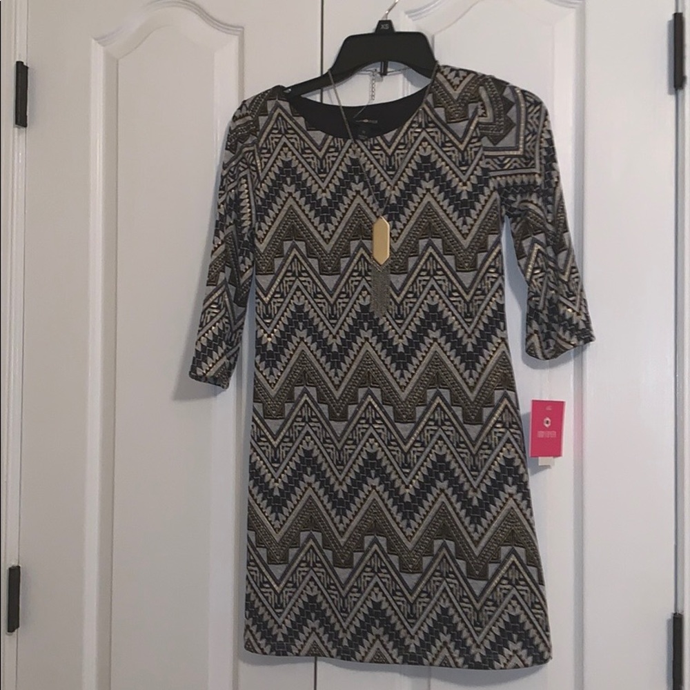 black and gold girls dress with necklace
